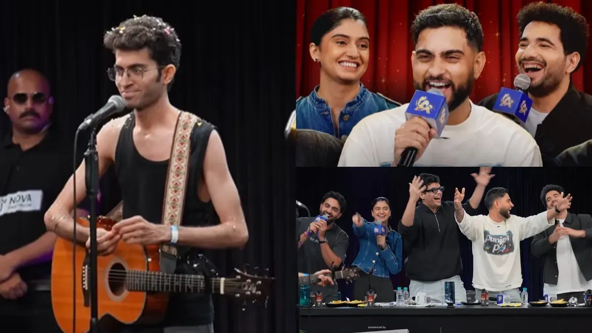 Gaurav Madaan smiling on stage, holding a trophy.