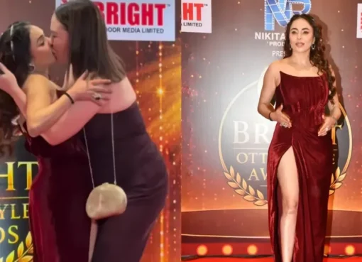 Nikita Rawal looking shocked on a red carpet.