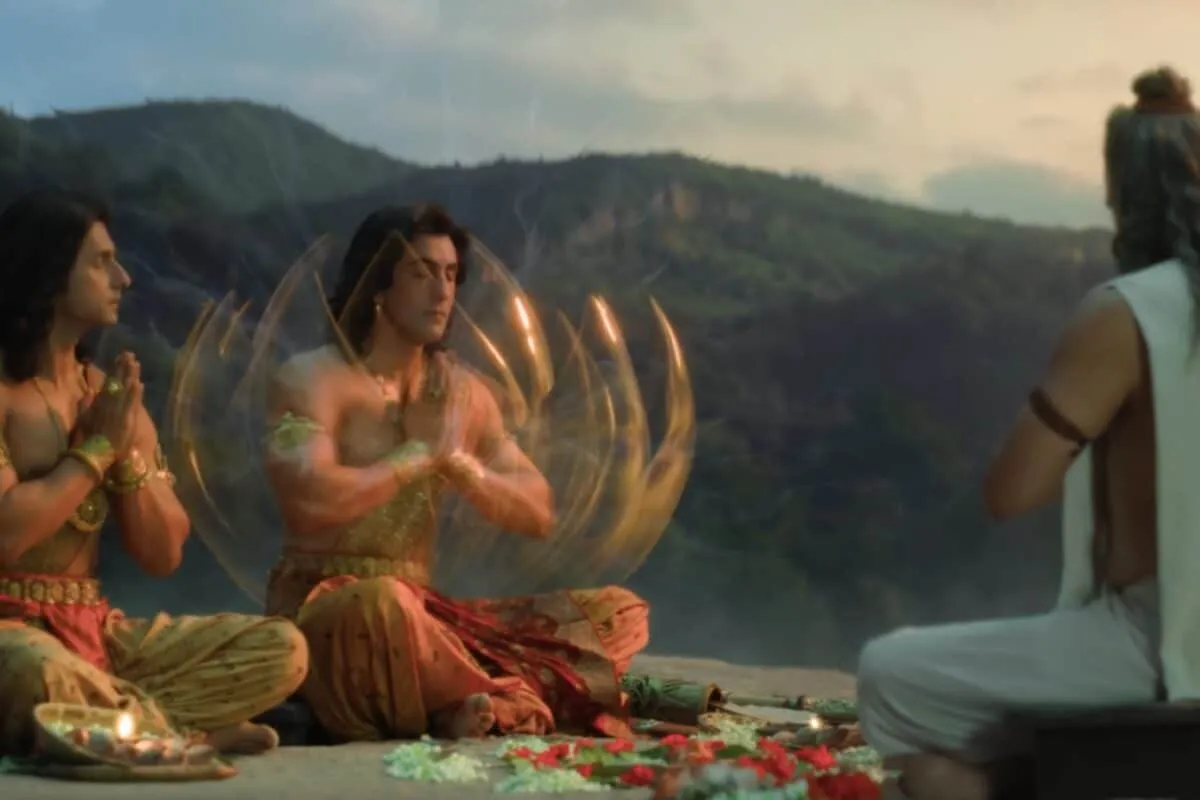 A still from the Ramayana trailer showing Lord Rama with a bow and arrow, looking powerful.