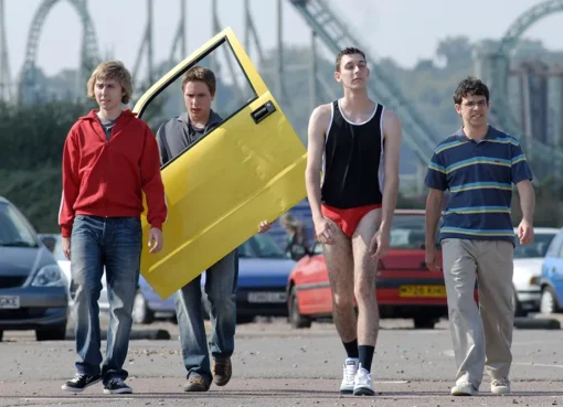The four main cast members of The Inbetweeners smiling for a photo.