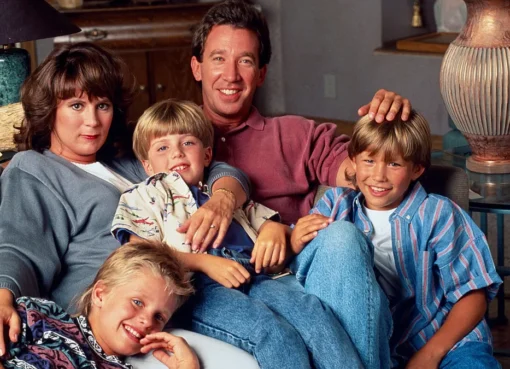 Patricia Richardson poses with Jonathan Taylor Thomas and Taran Noah Smith.