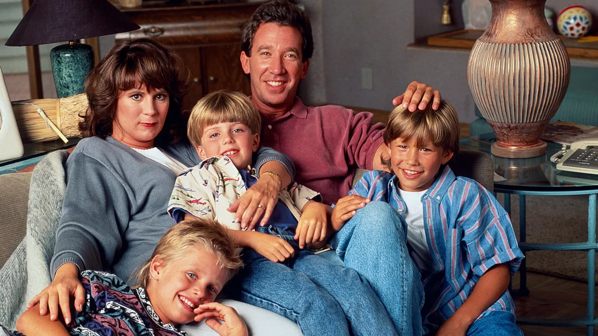 Patricia Richardson poses with Jonathan Taylor Thomas and Taran Noah Smith.