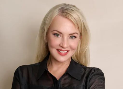 Wendi McLendon-Covey smiling.