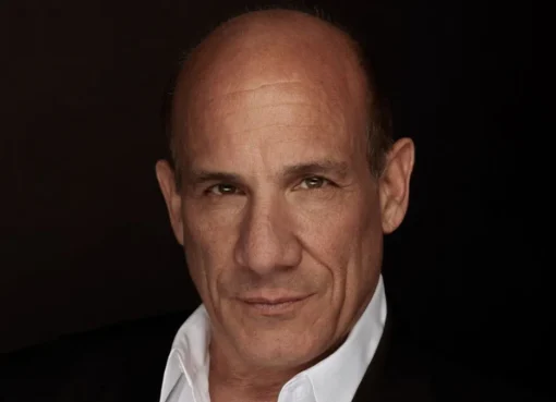 Actor Paul Ben-Victor posing for a photo.