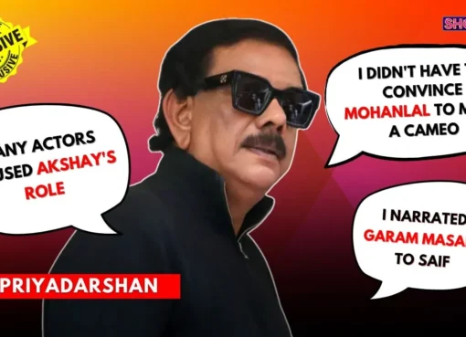 Priyadarshan and Boman Irani smiling and talking during an interview