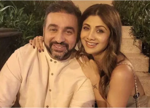 Raj Kundra and Shilpa Shetty looking serious at an event