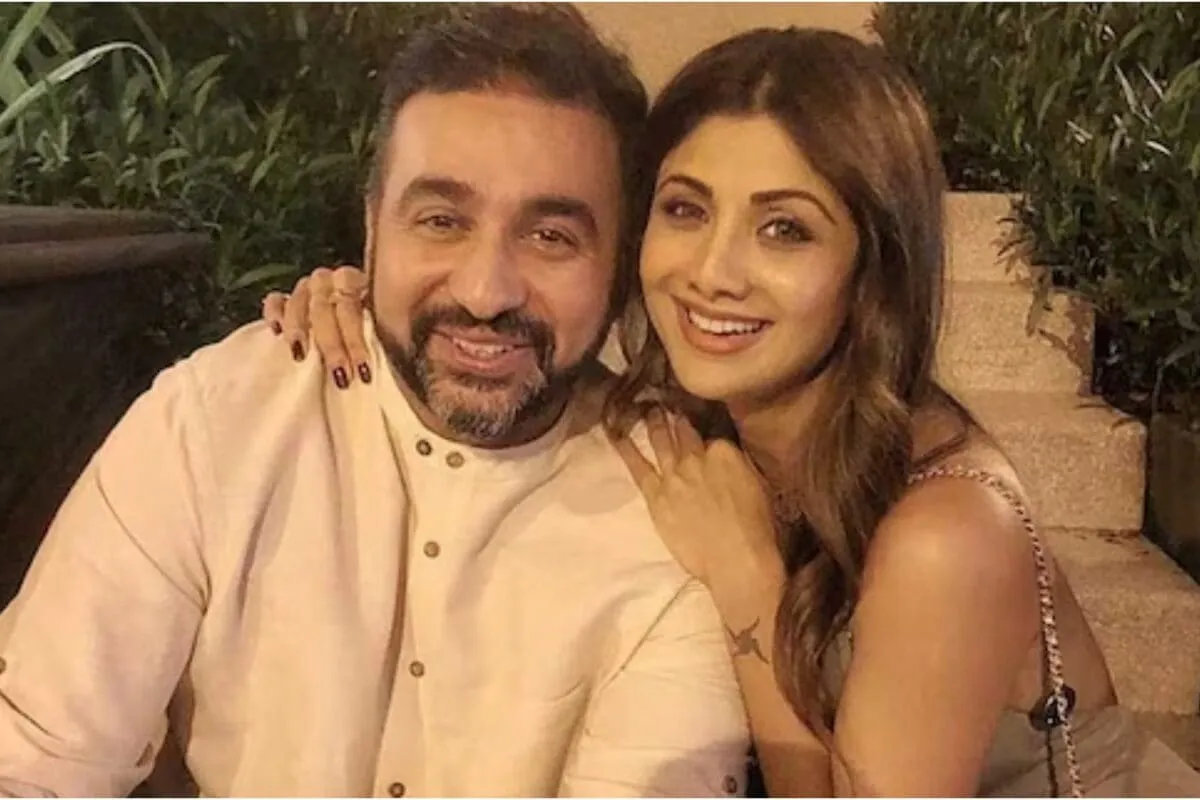 Raj Kundra and Shilpa Shetty looking serious at an event