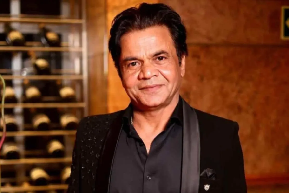 Actor Rajpal Yadav smiling and interacting with fans.