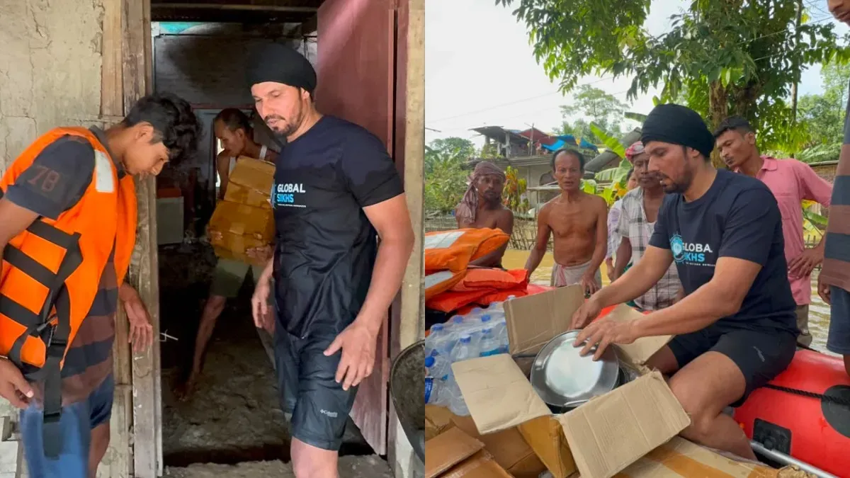Randeep Hooda interacting with people in a flood-affected area in Assam.