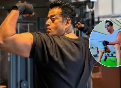 Ravi Kishan smiling and looking fit, possibly in a light, comfortable outfit, demonstrating a gentle Tai Chi pose.