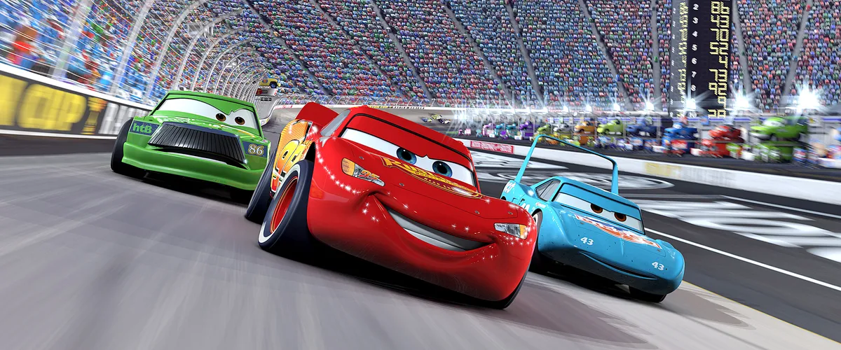 Lightning McQueen, the red race car from Pixar's Cars, smiling and driving.