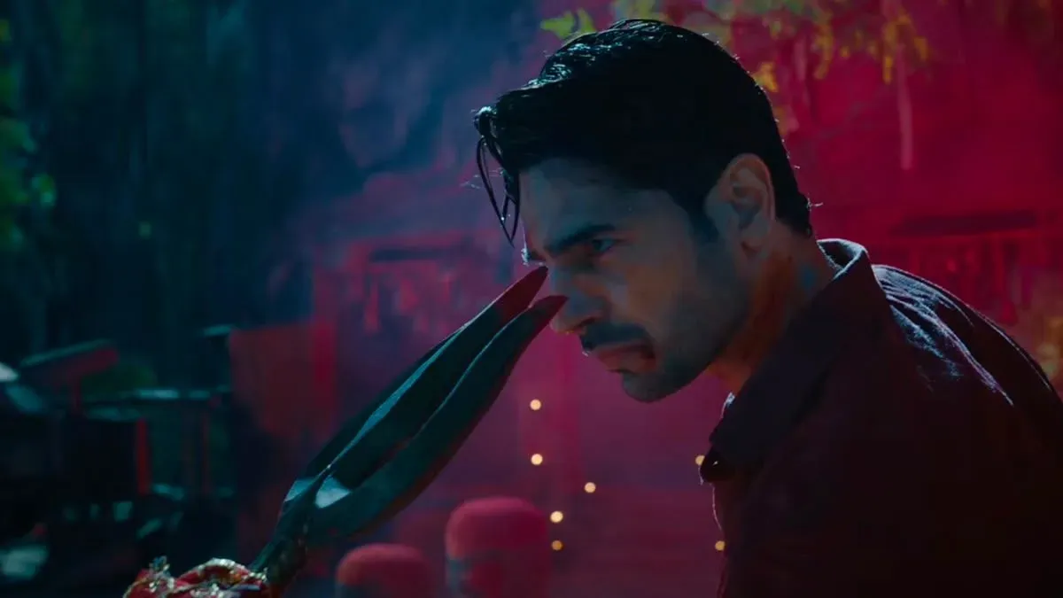 Sidharth Malhotra looking thoughtfully at something, hinting at curiosity about Vvaan.