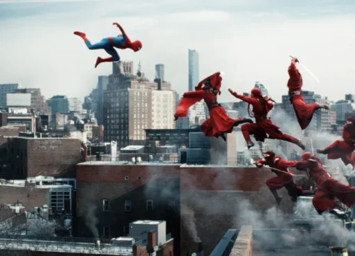 Spider-Man swinging through a vibrant city skyline during the day, with red and blue colors prominent.
