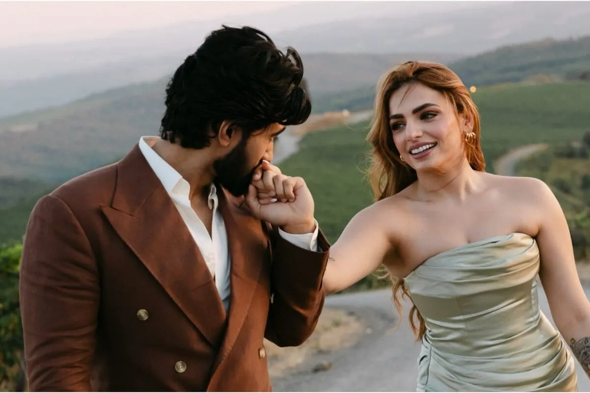Sukriti Kakar and Shoumik Shetty smiling after their engagement proposal.