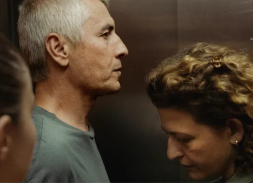 Director Visar Morina discusses his film 'Shame and Money' at a festival.