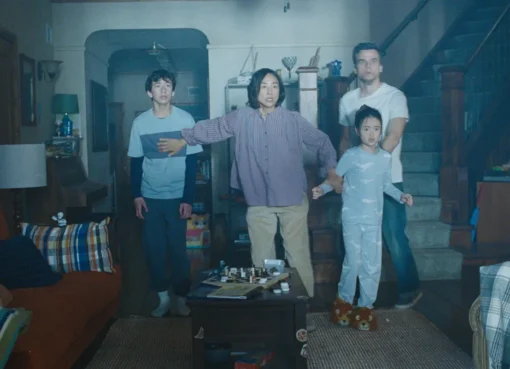 A family looking scared inside their home.