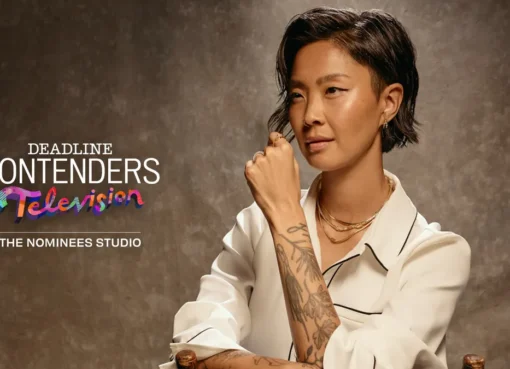 Kristen Kish smiles while hosting Top Chef.