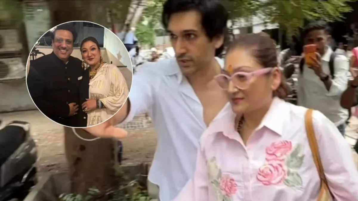 Sunita Ahuja and her son Yashvardhan leaving a court building.