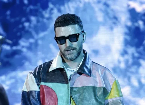 Justin Timberlake and Don Toliver performing together on stage under bright concert lights.
