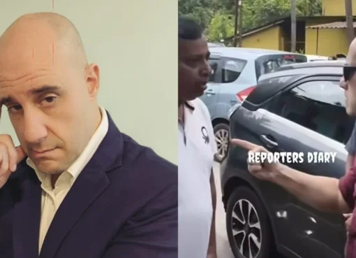 Ashwin Mushran talking to people in Goa, with a car in the background.