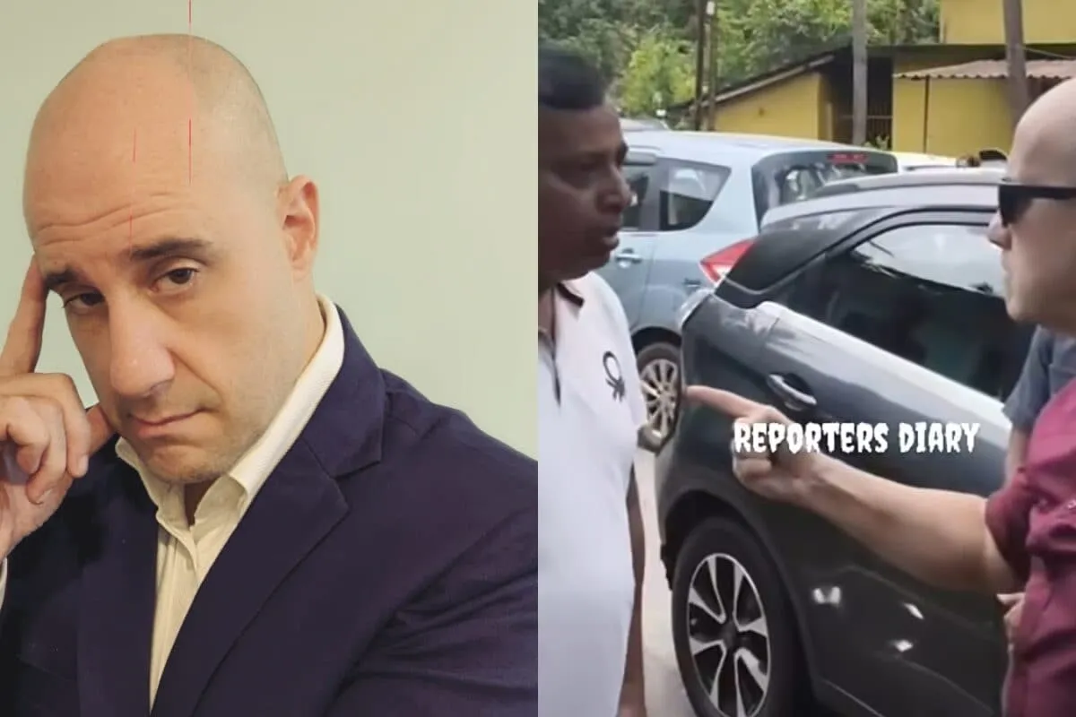 Ashwin Mushran talking to people in Goa, with a car in the background.