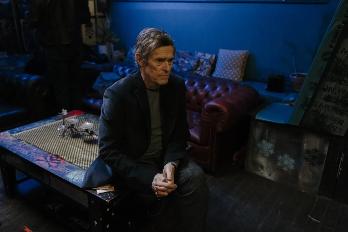 Willem Dafoe looking thoughtful and intense, perhaps discussing his acting philosophy.