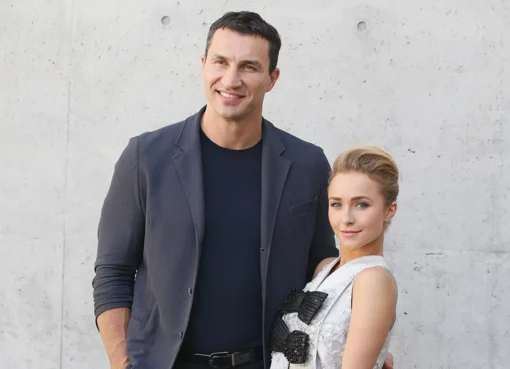 Wladimir Klitschko looking somber, possibly with a faint image of Hayden Panettiere in the background.