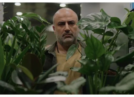Still from the film 'A Bit of Light' showing two people talking intensely in a serious scene.