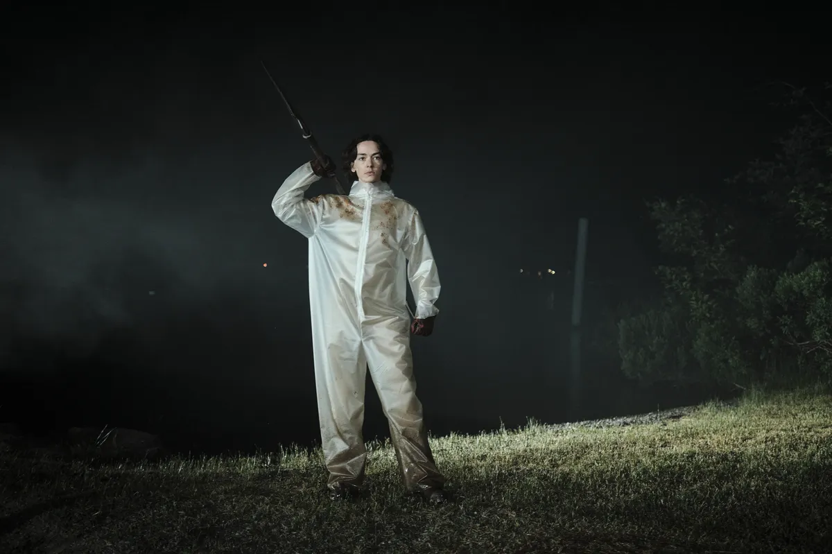 Jack Haven as Little Death in 'Teenage Sex and Death at Camp Miasma' during a chaotic, bloody massacre scene.