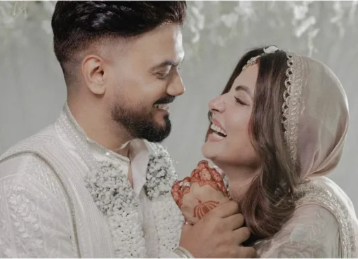 Hina Khan and Rocky Jaiswal sharing a tender moment, looking supportive.