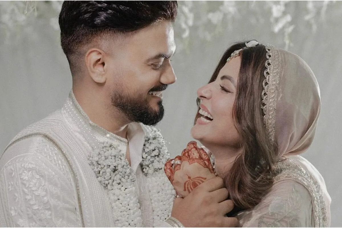 Hina Khan and Rocky Jaiswal sharing a tender moment, looking supportive.