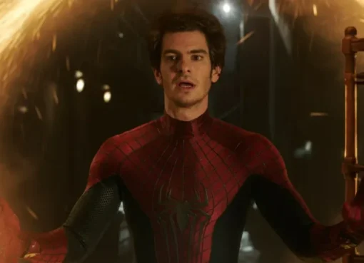 Andrew Garfield smiling and looking reflective during an interview.