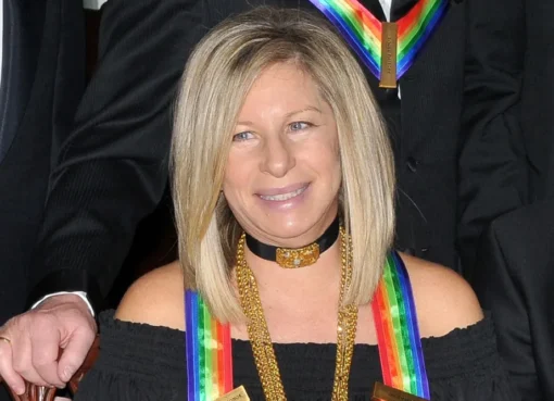 Barbra Streisand looking thoughtful and serious.