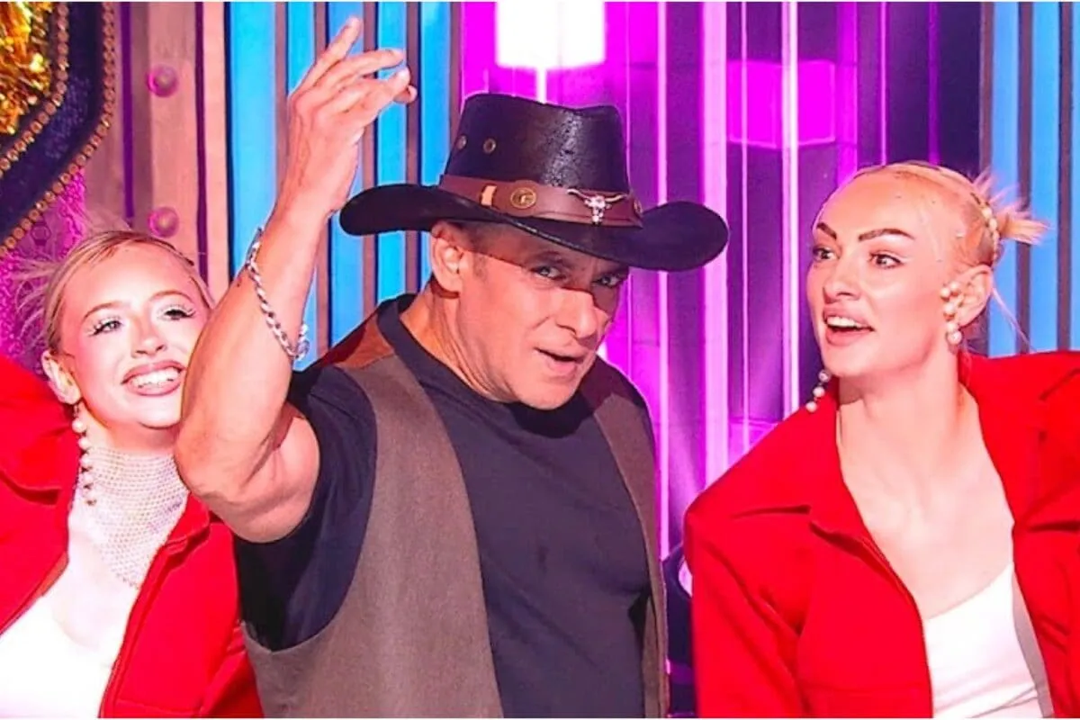 Salman Khan hosting Bigg Boss on a vibrant stage.