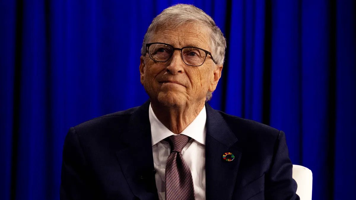 Bill Gates looking thoughtful and concerned.