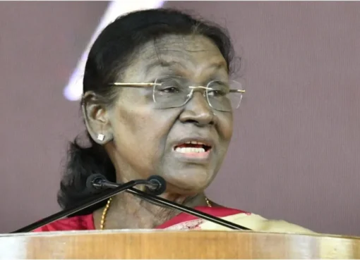 President Droupadi Murmu speaking at an awards ceremony.