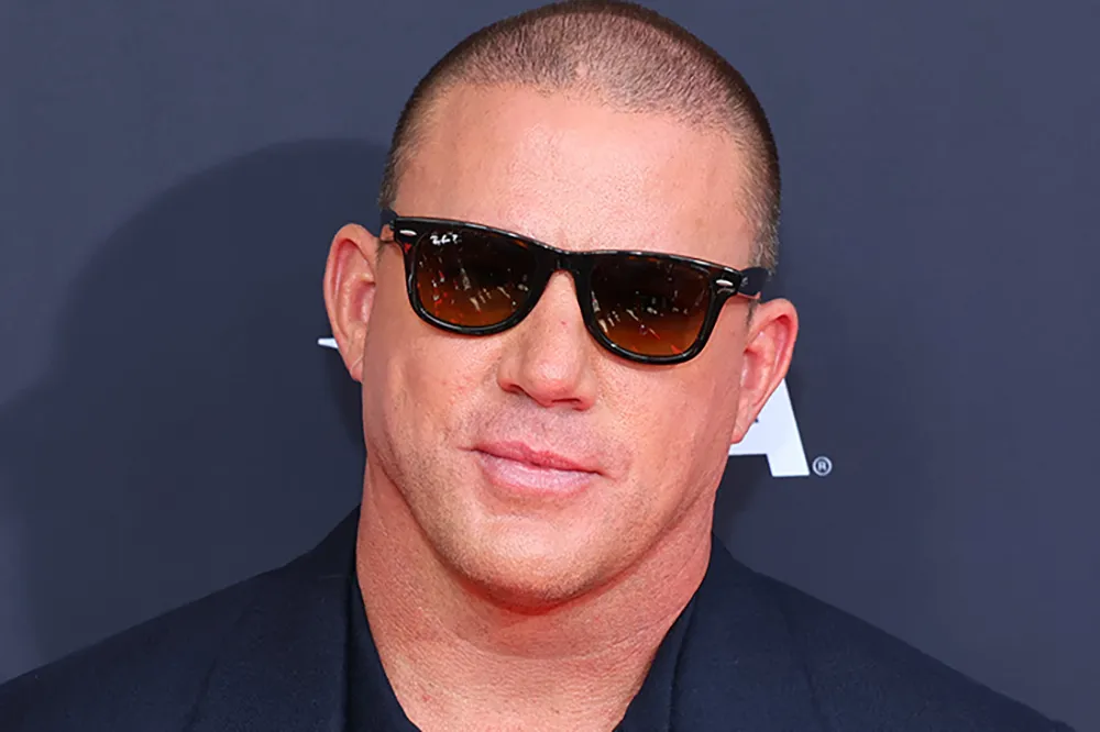 Channing Tatum looking amused and surprised while addressing a camera.