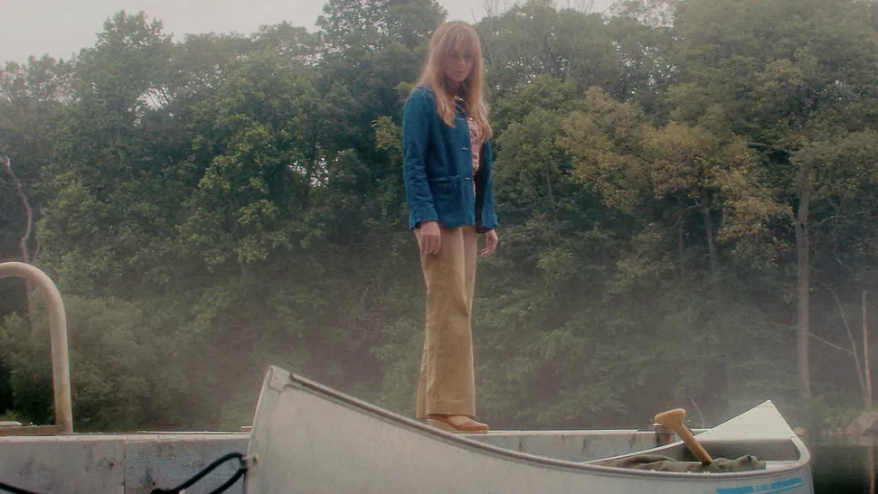 A still from the Crystal Lake show trailer showing a dark, misty forest.