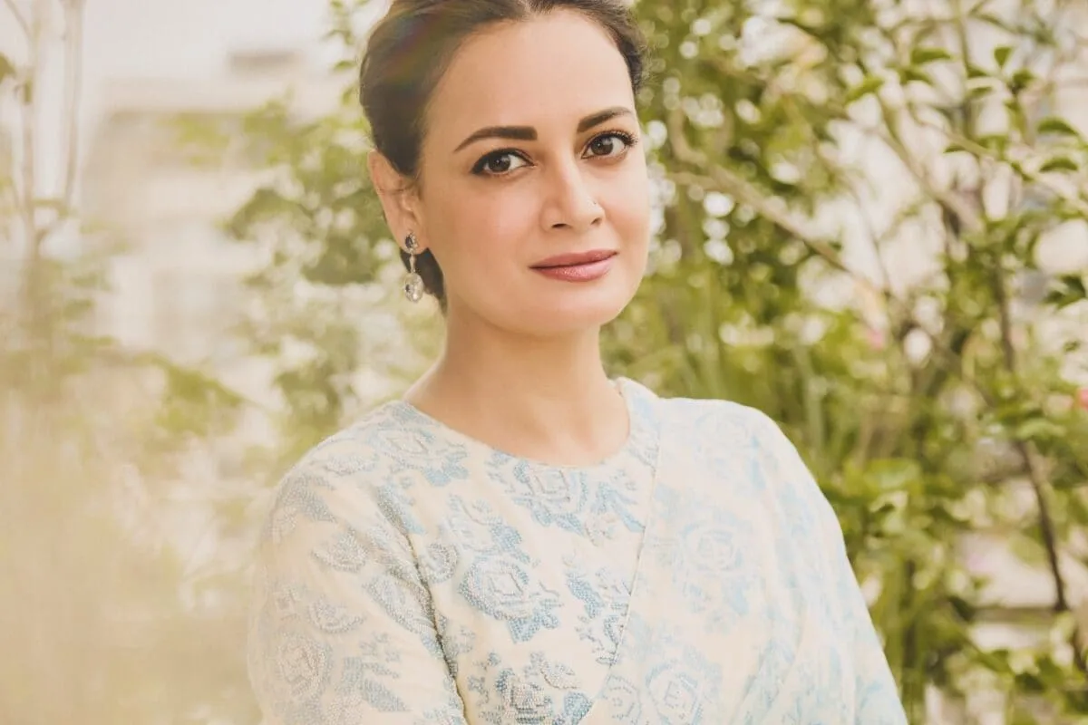 A serious portrait of actress Dia Mirza looking thoughtful.