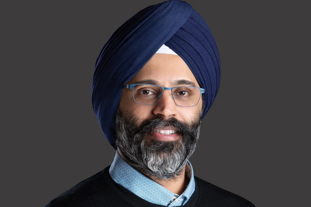 Karandeep Anand, Disney's new CTO, smiling.