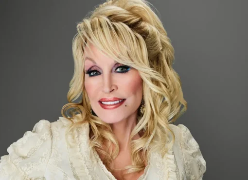 A photo of Dolly Parton smiling.