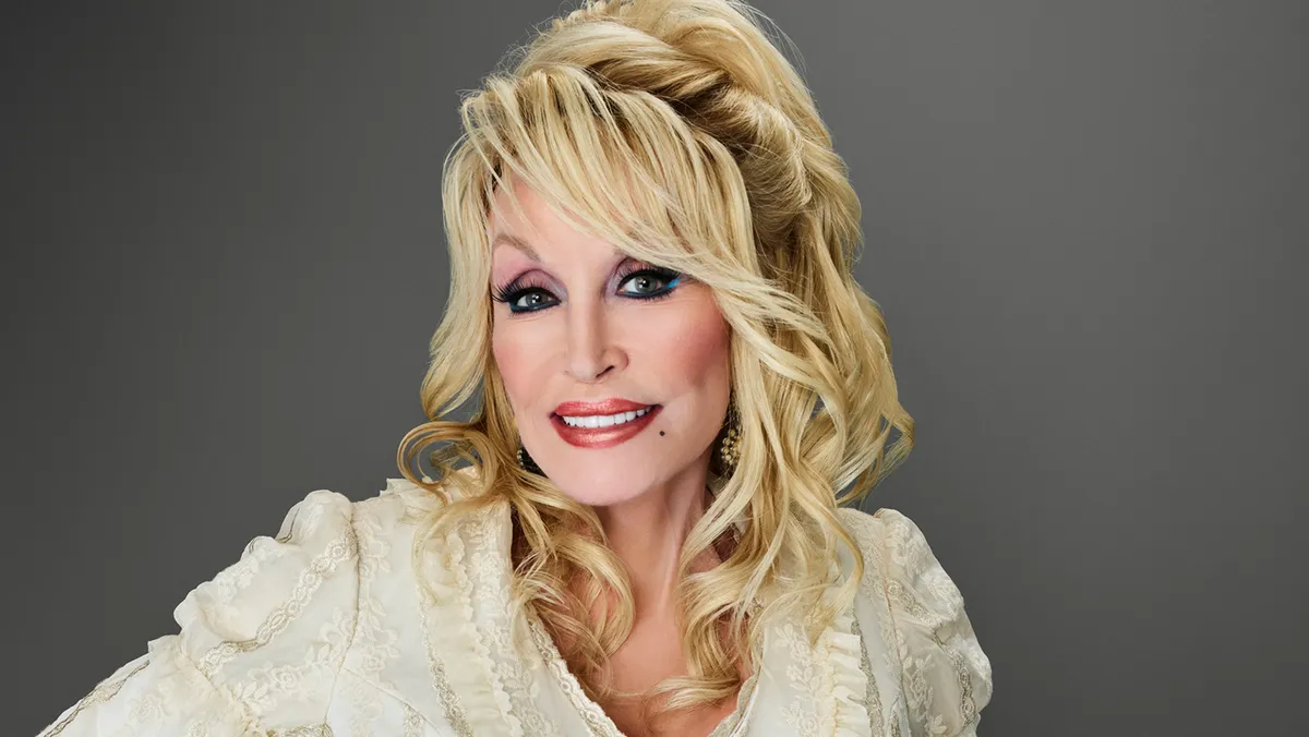 A photo of Dolly Parton smiling.