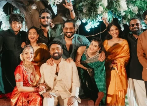 Dulquer Salmaan, Kalyani Priyadarshan, Mamitha Baiju and the Lokah team smiling and celebrating at Ahaana Krishna and Nimish Ravi's wedding.