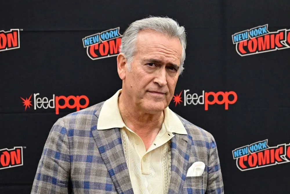 Bruce Campbell looking serious and determined.
