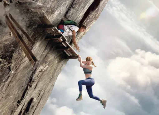 A tense movie scene with a person looking down from a great height.
