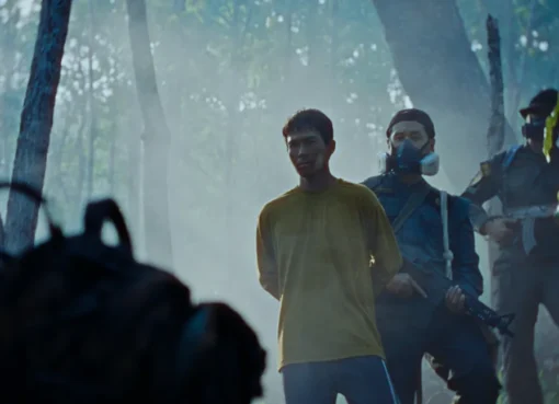 A foggy forest scene with purple skies, from the movie 'The Burning Giants'.