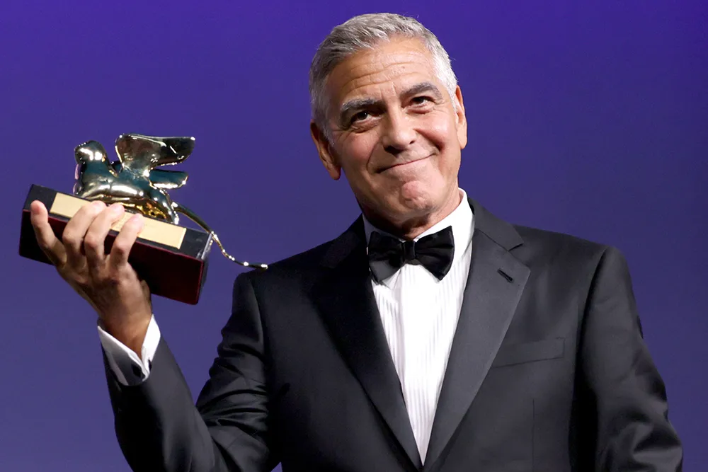 George Clooney giving a speech at the Venice Film Festival.