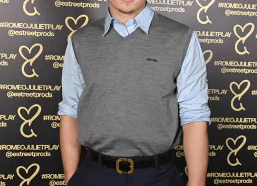 Close-up photo of Noah Jupe smiling slightly.