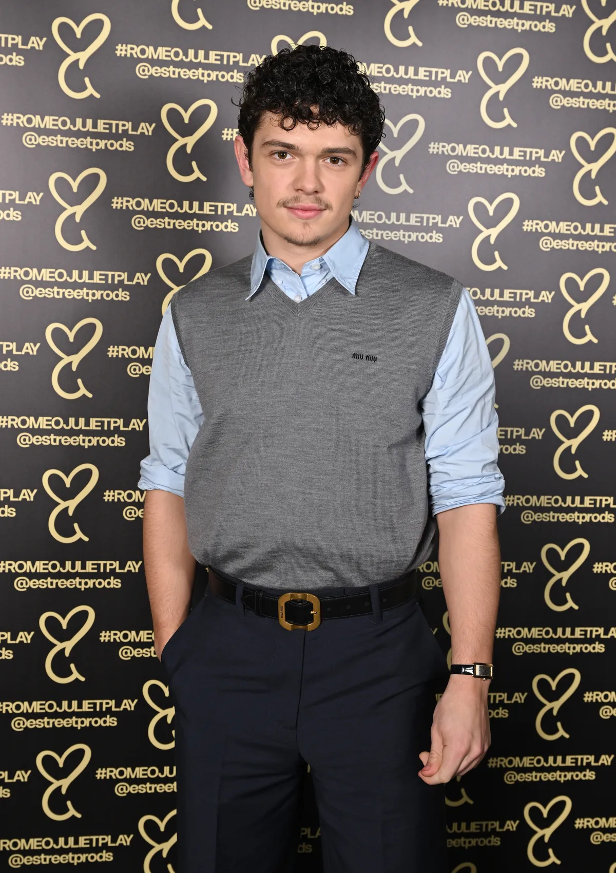 Close-up photo of Noah Jupe smiling slightly.