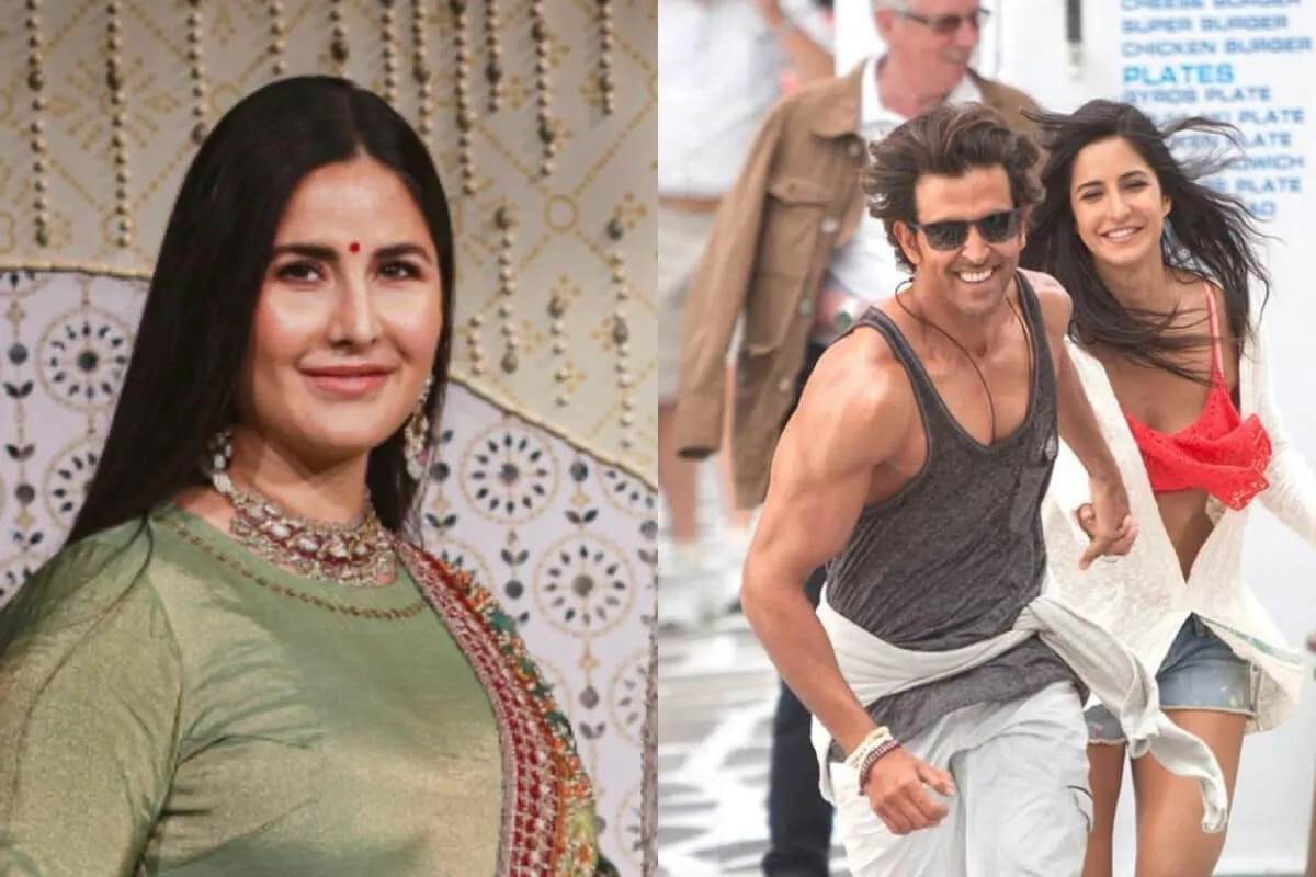 Hrithik Roshan and Katrina Kaif smiling and posing together at a film event.